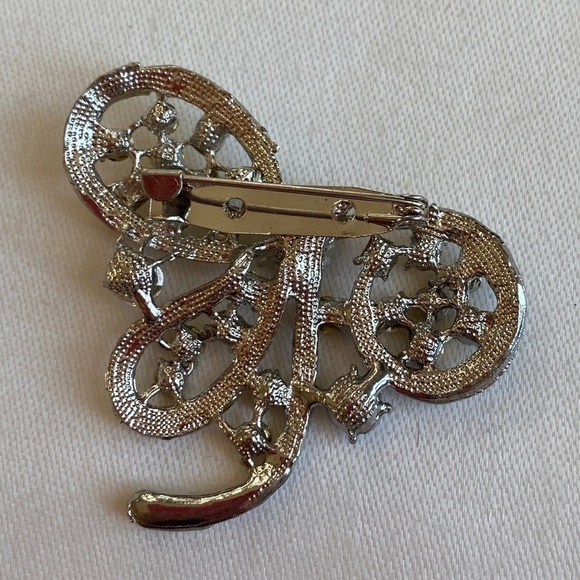 Vintage Brooch Pin set in silver tone metal with yellow and clear crystals. - Picture 2 of 3